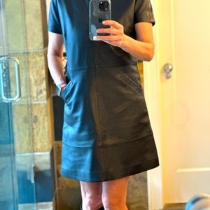 Balenciaga Leather mini dress with pockets. 36” bust, 38” hips, 35.5” length.